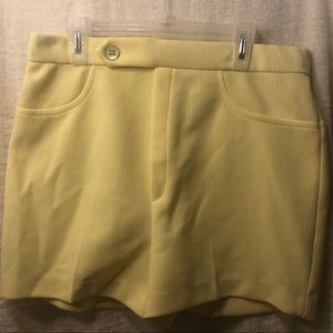 pastel yellow shorts, textured